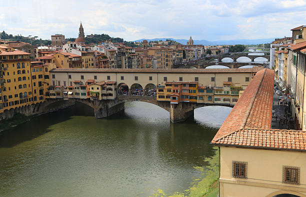 istock bridge called Ponte Vecchio and Vasari Corridor in Florence Ital 486678162