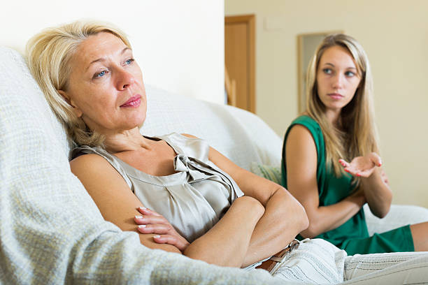 istock daughter  and  sad mature mother having conflict 486679694