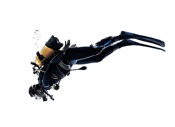 one caucasian scuba diver diving man  in studio  silhouette isolated on white background