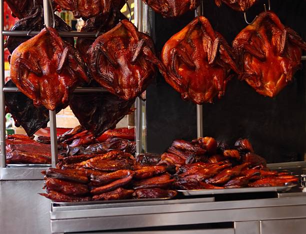 istock Roasted ducks at street market 486683116