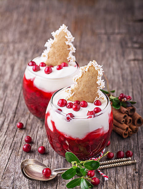 istock Festive dessert with cranberry sauce, sour cream and ginger biscuits 486683656