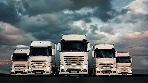 Haulage Fleet Heroic or epic fleet of semi-trucks and trailers. semi truck photos stock pictures, royalty-free photos & images
