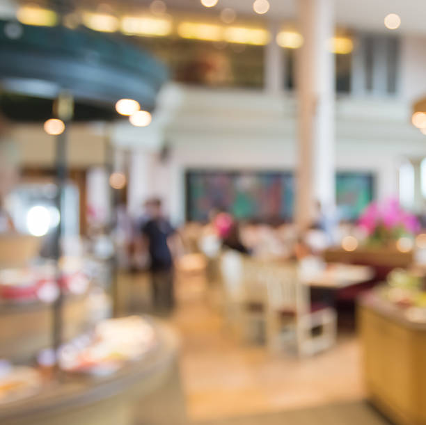istock blur people  sitting on seat in dining room with bokeh 486687956
