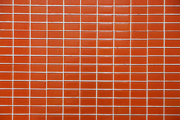 istock Wall and floor mosaic tiles orange color 486688364