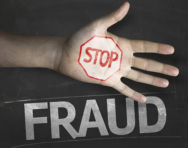 Photo of Educational and Creative composition with the message Stop Fraud