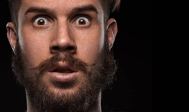 istock Close-up portrait of amazed guy 486691076