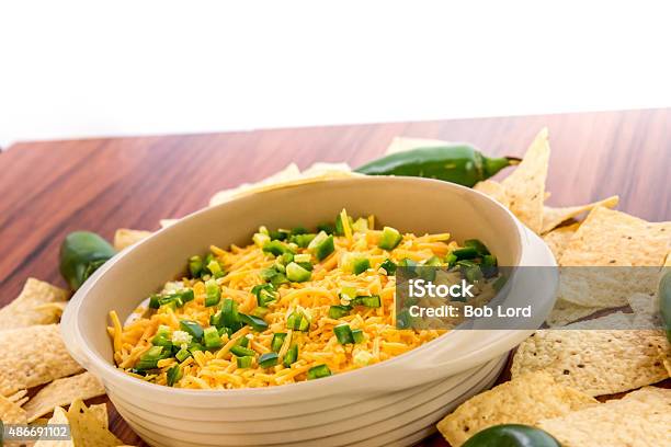 Bean Dip With Jalapenos Sour Cream And Cheddar Cheese Stock Photo - Download Image Now