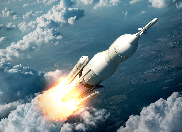 Space Launch System Flying Over The Clouds Space Launch System Flying Over The Clouds. 3D Scene. space travel vehicle stock pictures, royalty-free photos & images