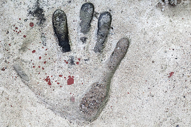 istock Handprint in the old concrete slab 486692088