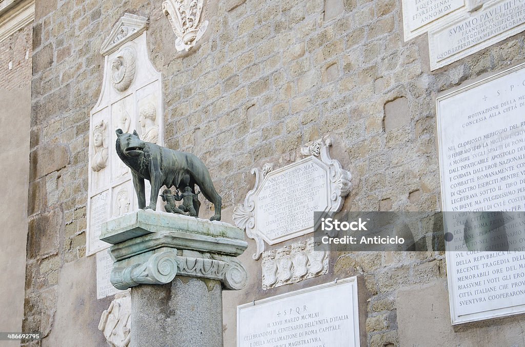 She-wolf with Romulus and Remus Sculpture of Romulus and Remus drinking milk from a she-wolf Rome - Italy Stock Photo