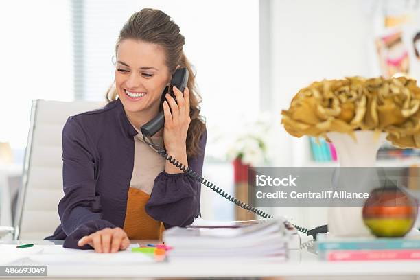 Happy Fashion Designer Talking Phone In Office Stock Photo - Download Image Now - Adult, Art And Craft, Beautiful People