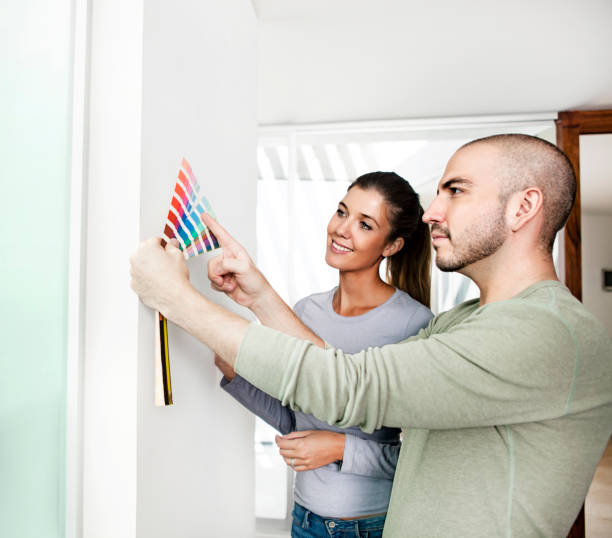 istock Young couple redecorating their home 486695861