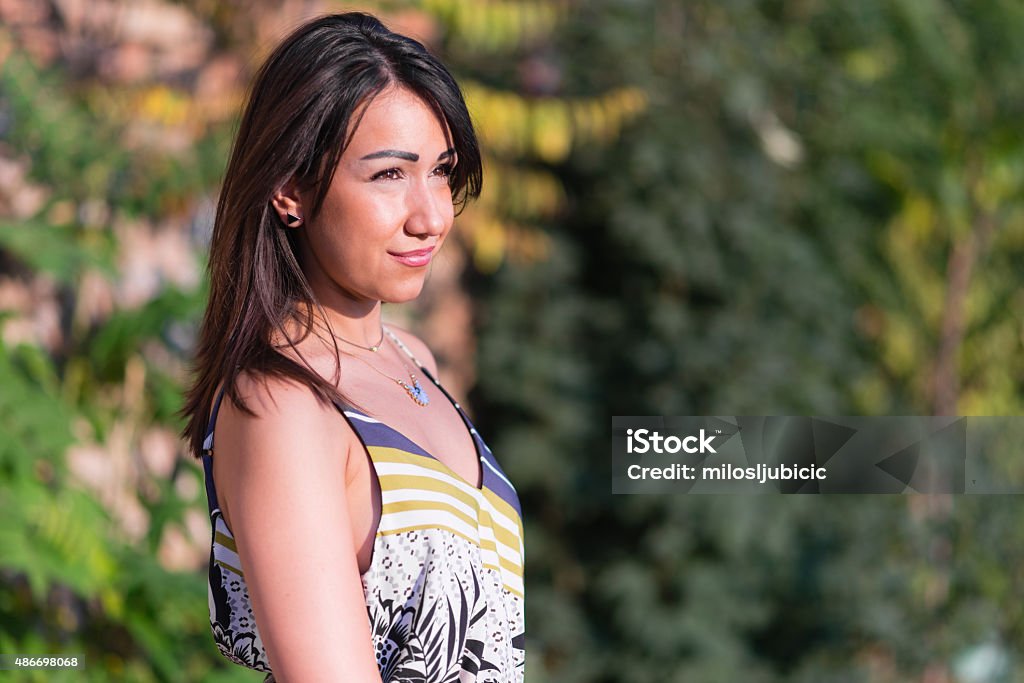 Brunette Beautiful brunette outdoors, natural looking girl 2015 Stock Photo