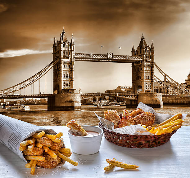 istock Fish and Chips against Tower Bridge in London, England 486700376