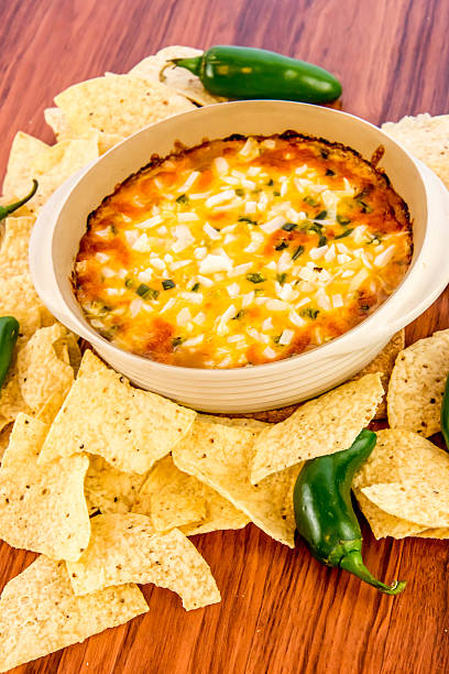 istock bean dip with jalapenos, sour cream and cheddar cheese 486700676