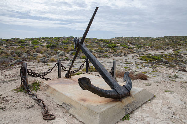 istock ship wreck ancor on a pedestal in coastal dunes 486702074