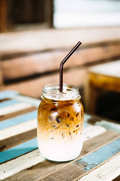Photo of Iced Coffee Glass On The Table Wood