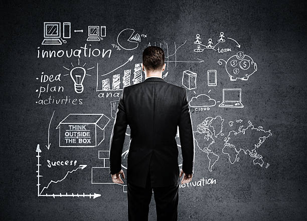 istock businessman looking to business plan 486706576