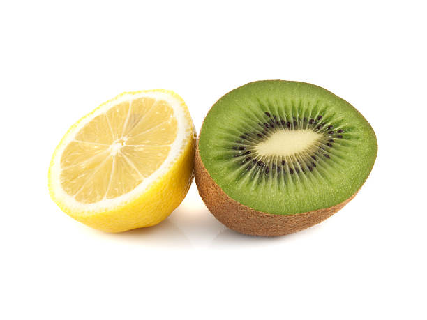istock Isolated sliced half of kiwi and lemon 486708211