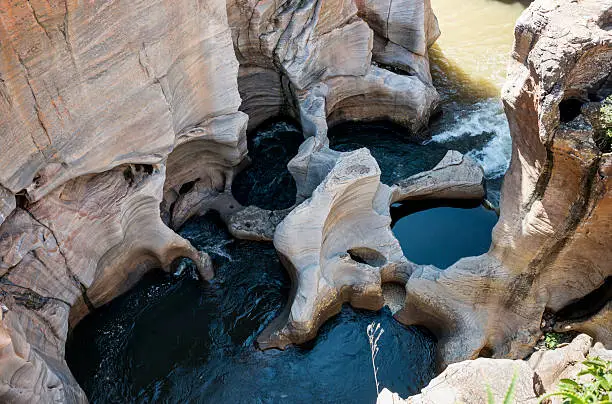 river at the bourkes potholes in south africa near the panoramaroute with big canyon and waterfalls