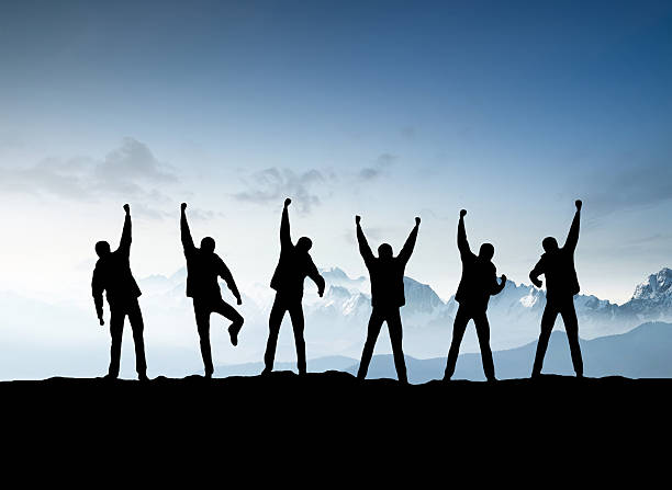 istock Silhouettes of team 486710756
