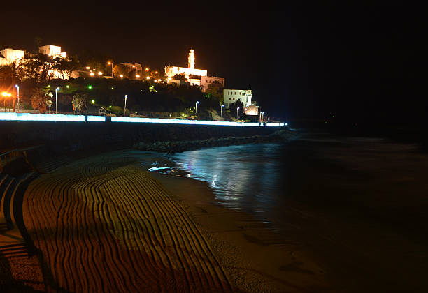 istock Church near a beach at night 486711269