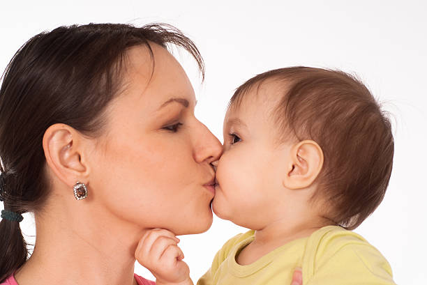 istock mom with her baby 486711612