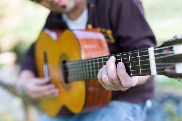 istock Guitarist in the street 486711623
