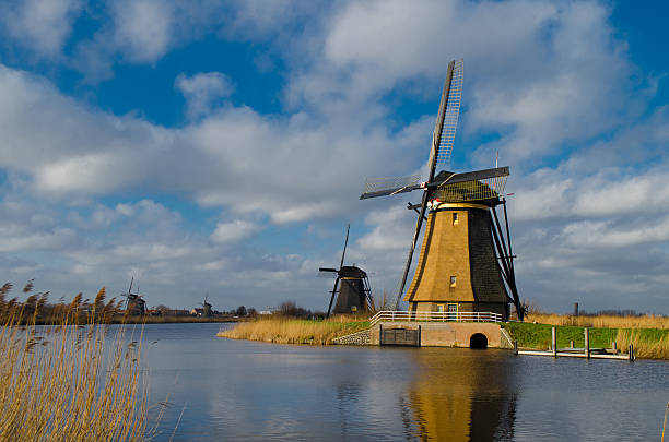 Windmill in Kinderdijk, Holland A windmill in Kinderdijk, Holland. lek river in the netherlands stock pictures, royalty-free photos & images