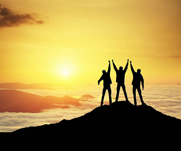 istock Silhouettes of team 486713404