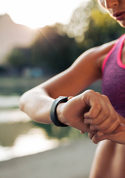 istock Fitness woman checking her performance on smartwatch 486717234
