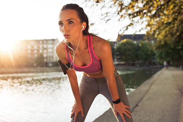istock Young sportswoman resting after run 486717692