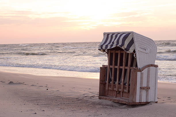 istock basket beach chair on the sand coast 486719140