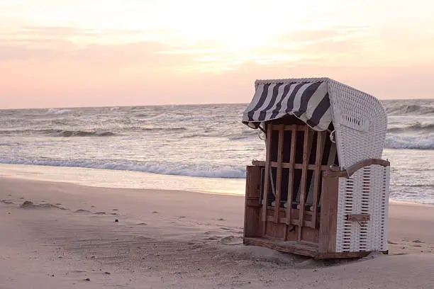 basket beach chair on the sand coast