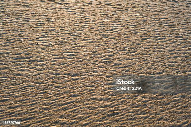 Morecambe Bay Sand Ripples Lit By The Setting Sun Stock Photo - Download Image Now - 2015, Coastline, Color Image