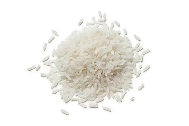 Heap of raw Jasmine rice  on white background
