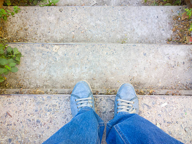 istock Feet on the stairs. 486724384