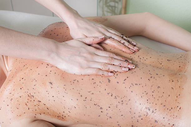 istock woman getting a chocolate massage at spa 486724691