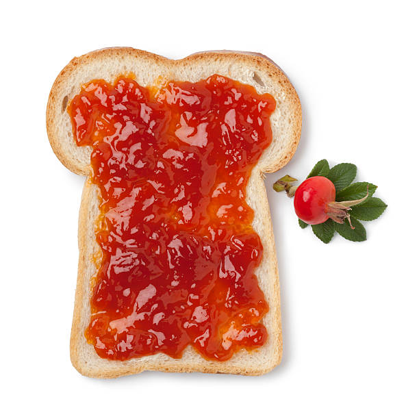 istock Slice of bread with jam of rose hips 486724864