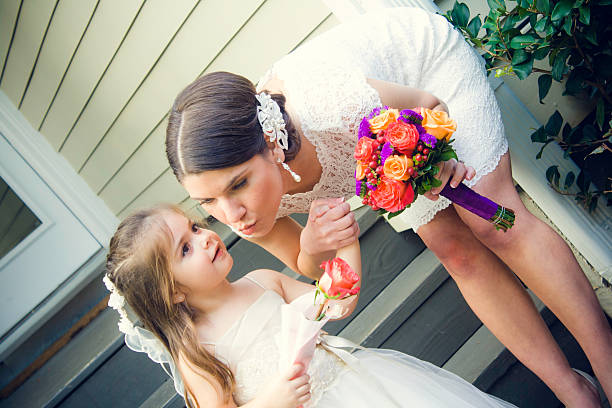 istock Bride and flower girl 486725631
