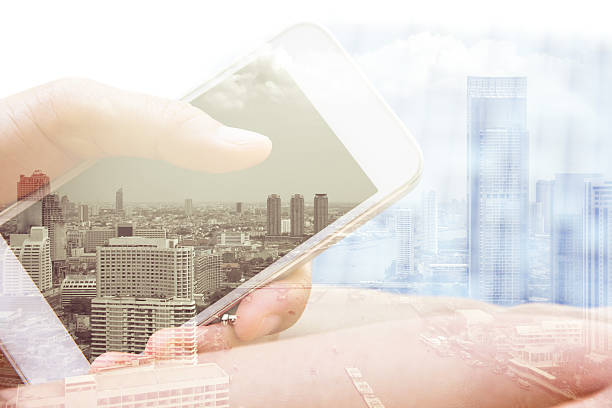 istock Double exposure of hand with mobile phone 486725920
