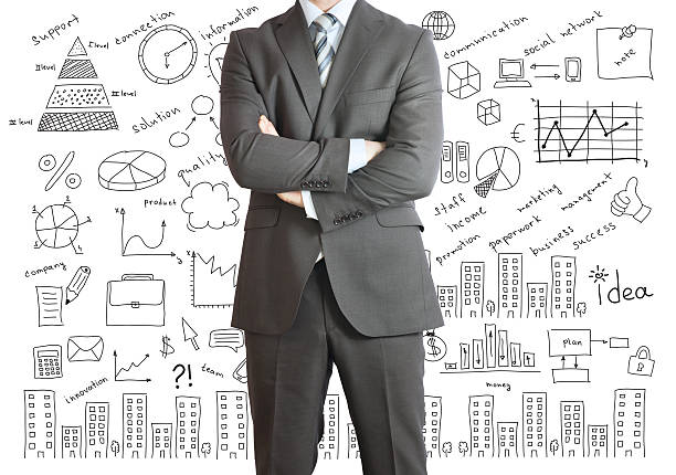 istock Man in suit and business plan 486726121