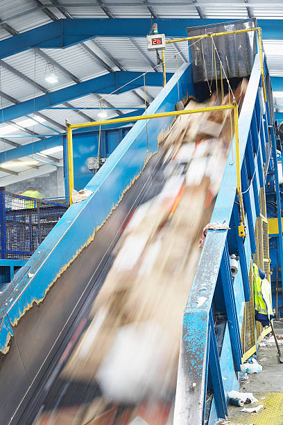 istock Rubbish On Conveyor Belt In Recycling Factory 486729795
