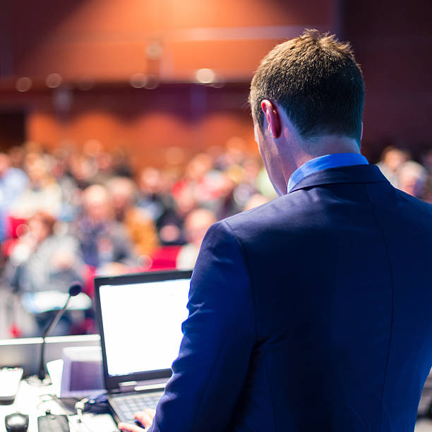 istock Speaker at Business Conference and Presentation. 486734424