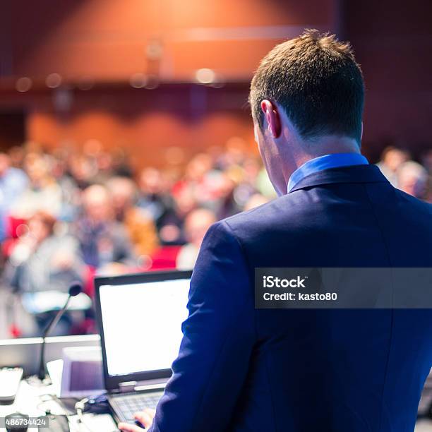 Speaker At Business Conference And Presentation Stock Photo - Download Image Now - Event, 2015, Adult