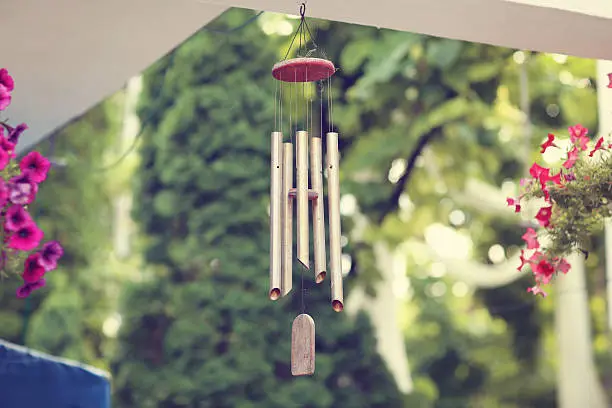 Photo of Silver and wood wind chimes