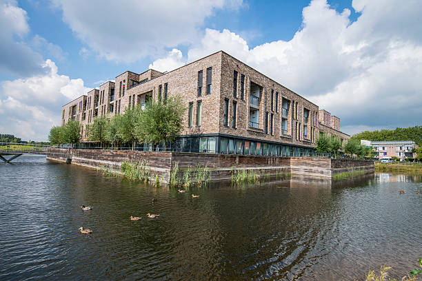 istock apartment building near water 486735432