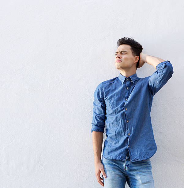 istock Male hipster posing with hand in hair 486736592