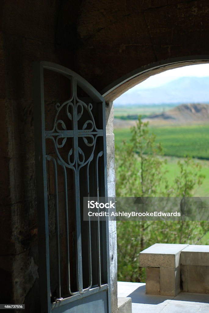 Iron Door at Khor Virap Cross embellished black iron door at Khor Virap, the ancient Armenian Monastery established by St Gregory of Gregory's Pit 2015 Stock Photo