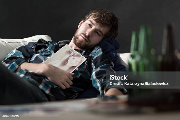 Depressed Man After Split Up Stock Photo - Download Image Now - Former, Couple - Relationship, Memories